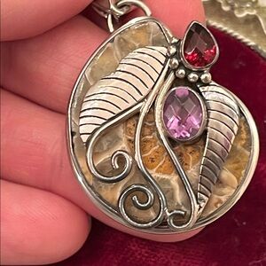 Ammonite Fossil .925 pendant with Red and Purple Gemstones